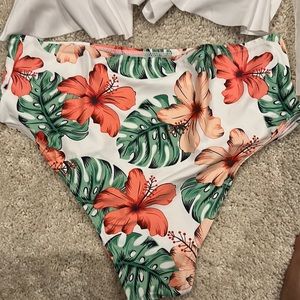 Brand new never worn two piece swim suit.